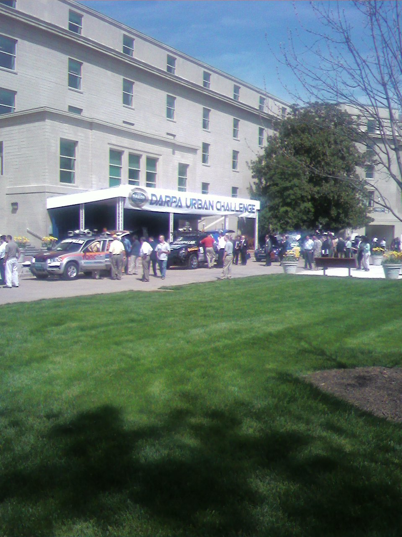 Illustration for article titled DARPA Urban Challenge Cars Invading Pentagon Parking Lot